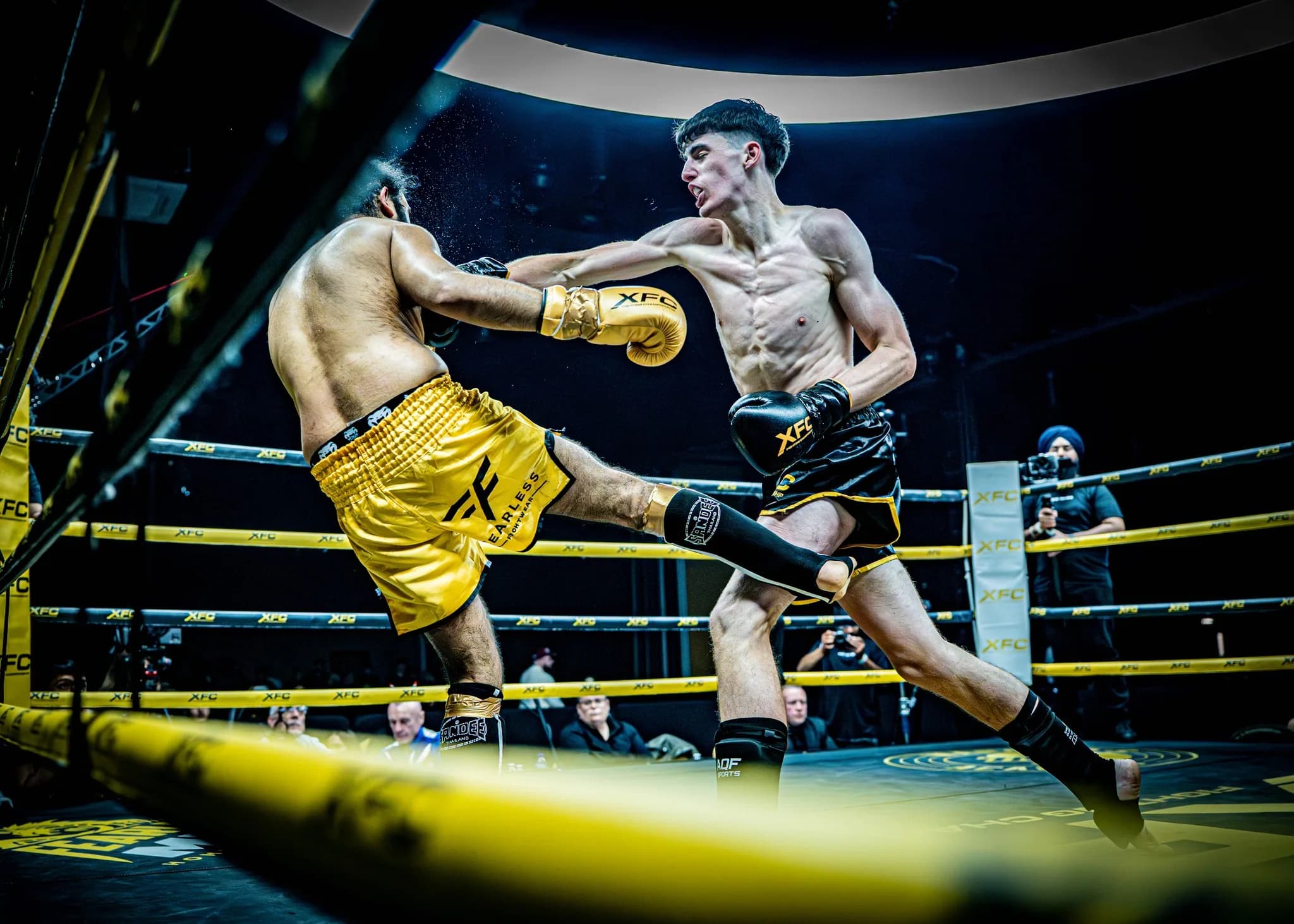 XFC ringside image of a decisive punch landing during a fast exchange.